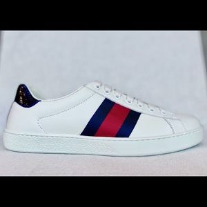 **Brand New** Gucci Ace Sneaker size 9.5 or EU42 white in color.